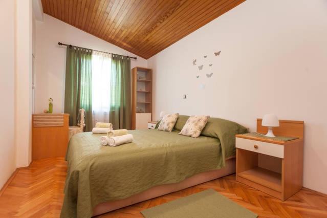 Postel nebo postele na pokoji v ubytování Apartment Erbirosa