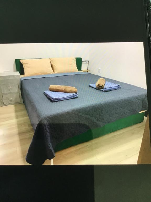 Postel nebo postele na pokoji v ubytování De Lux Nedeljkovic