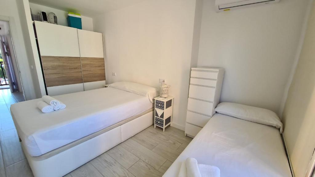 Postel nebo postele na pokoji v ubytování Apartamento Acacias IV 5 IF Benidorm