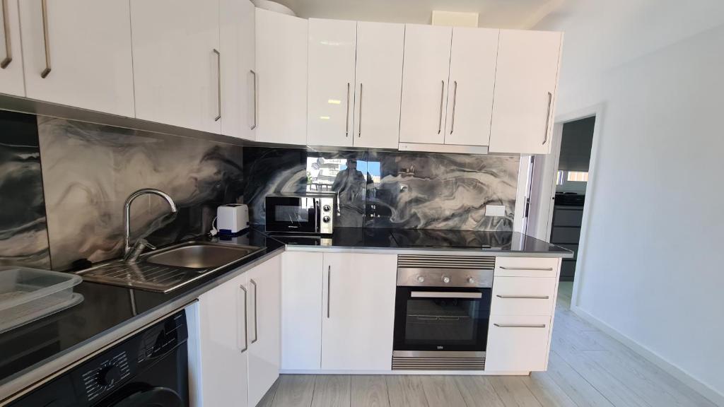 Kuchyň nebo kuchyňský kout v ubytování Apartamento Acacias IV 5 IF Benidorm