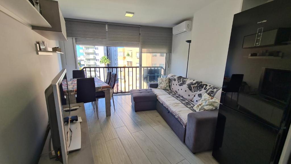 TV a/nebo společenská místnost v ubytování Apartamento Acacias IV 5 IF Benidorm