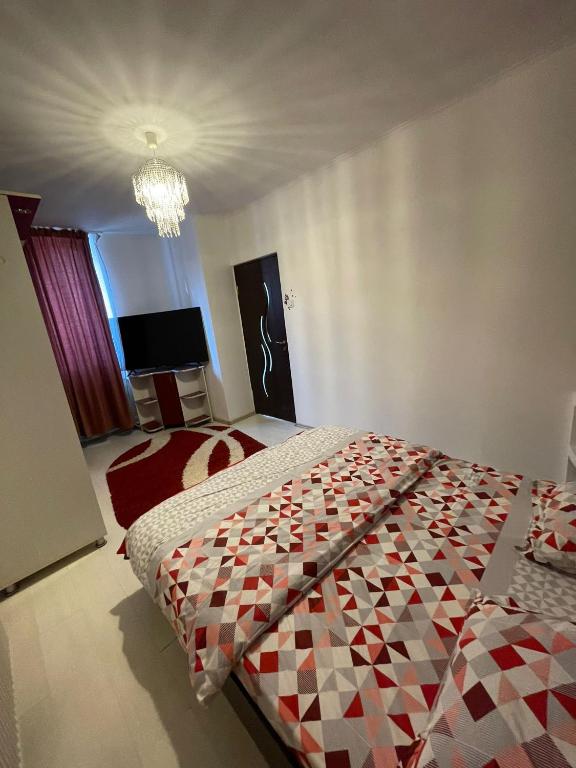 Postel nebo postele na pokoji v ubytování Zya Home Central