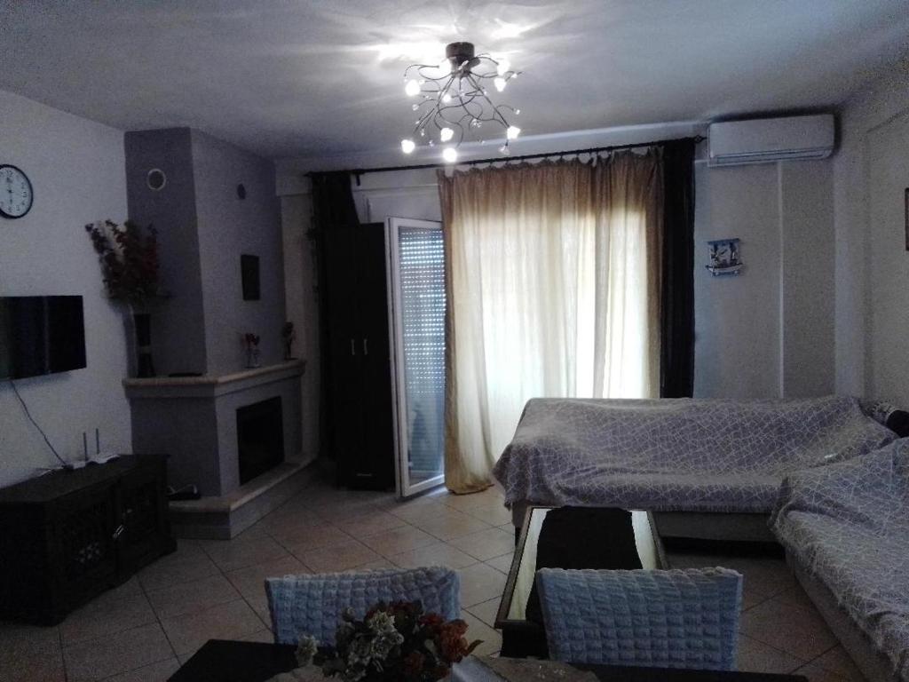 Postel nebo postele na pokoji v ubytování SOFI APARTMENT