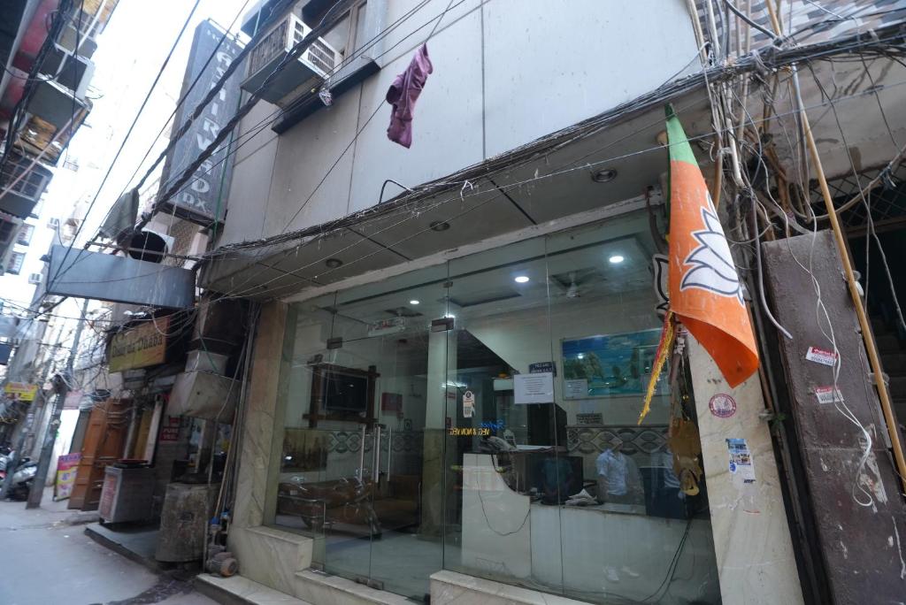 a store front of a building with a window at Hotel Ashirwad DX in New Delhi