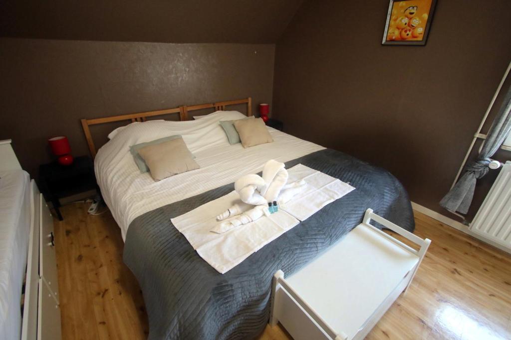 Postel nebo postele na pokoji v ubytování Chambre d'hôte Blankenberge