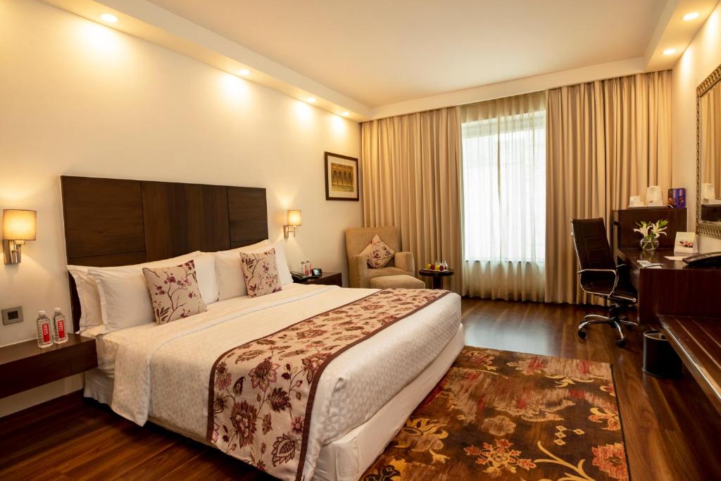 Postel nebo postele na pokoji v ubytování Four Points by Sheraton Jaipur, City Square