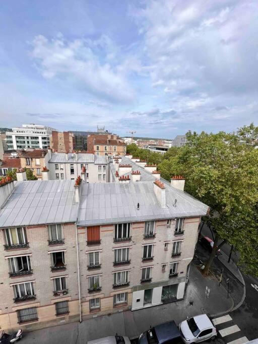 an overhead view of a building in a city at Paris Home in Boulogne-Billancourt