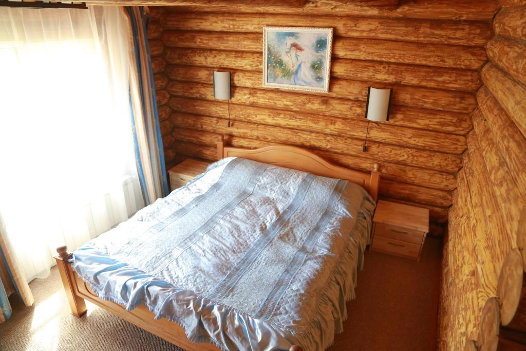 Postel nebo postele na pokoji v ubytování Tourist complex Karina