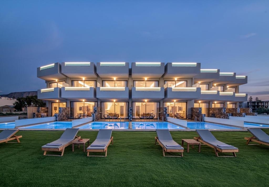 een weergave van een hotel met zwembad bij Crete Resort Sea Side Suites "Adults Only" by Checkin in Gouves