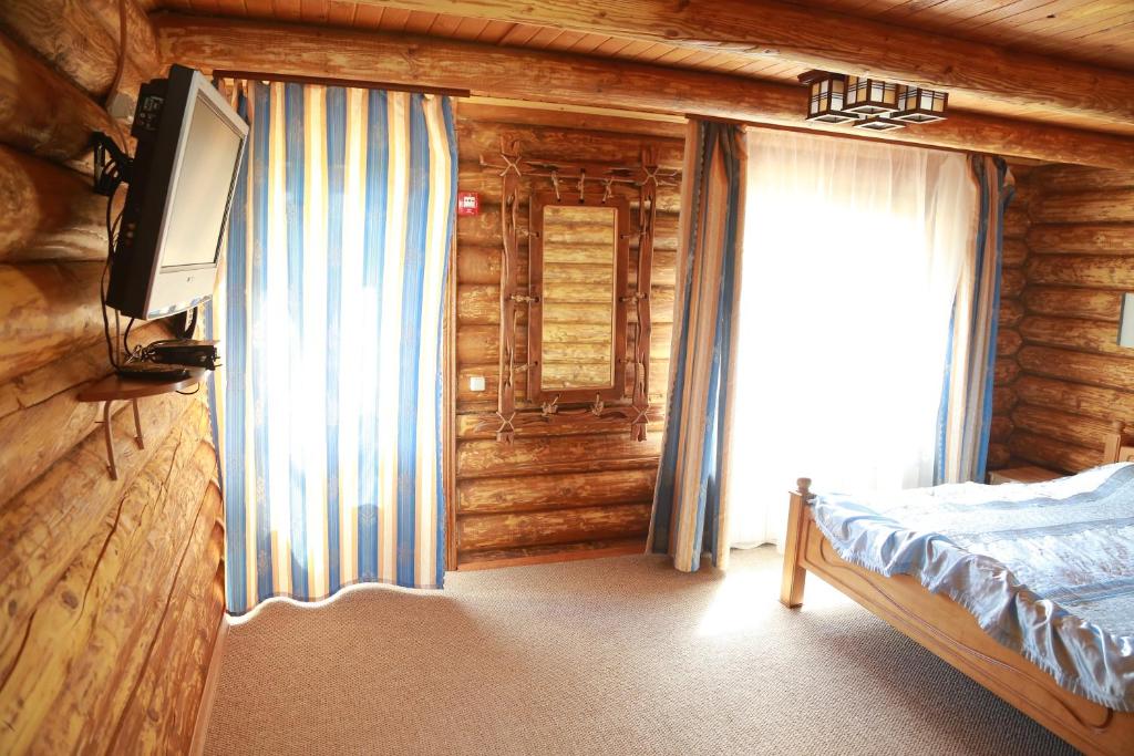 Postel nebo postele na pokoji v ubytování Tourist complex Karina