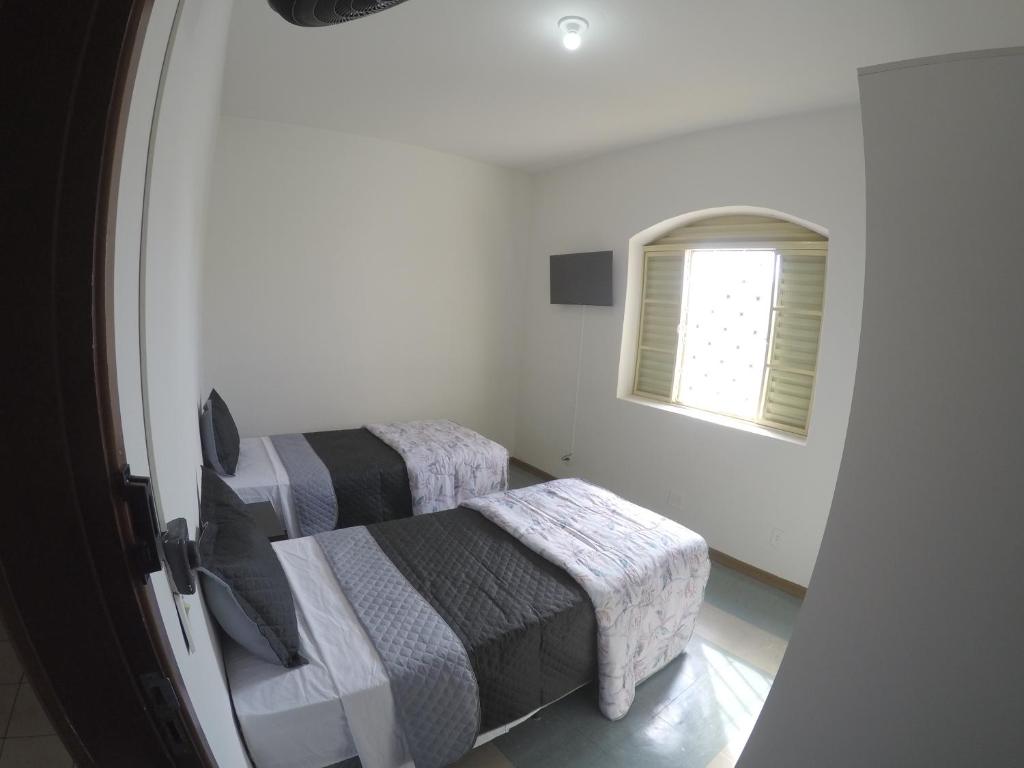 Quartos Delfim Moreira - Habitación Doble Estándar