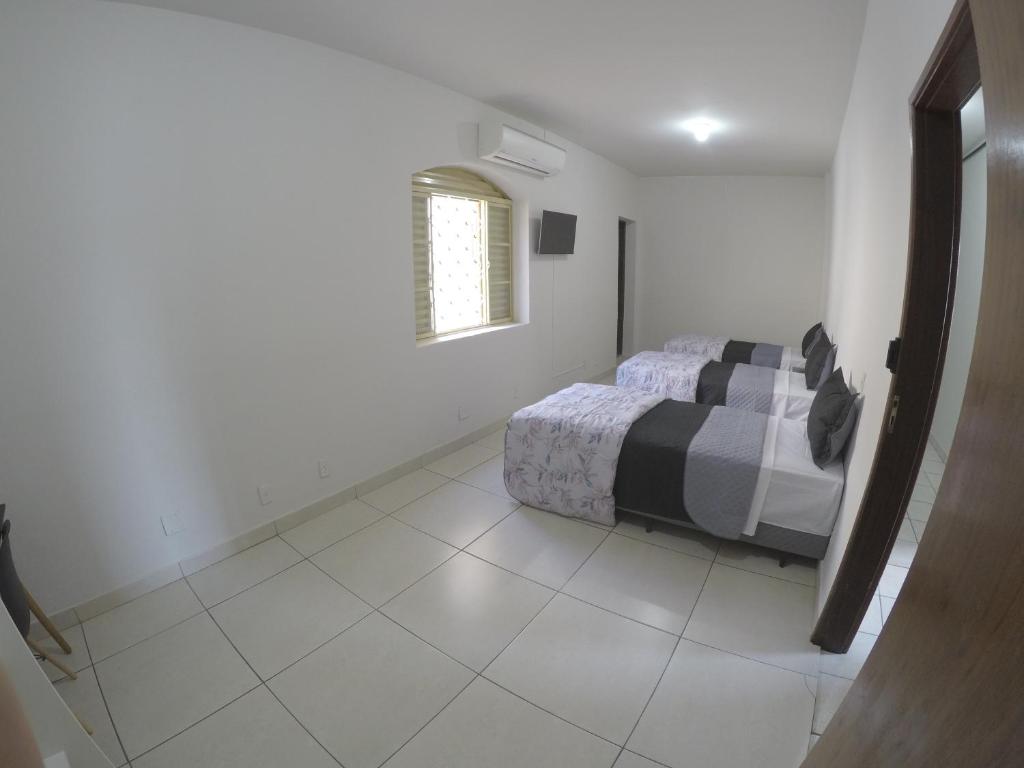Quartos Delfim Moreira - Habitación Triple De Lujo
