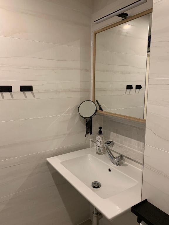 Koupelna v ubytování Pleskini Apartment