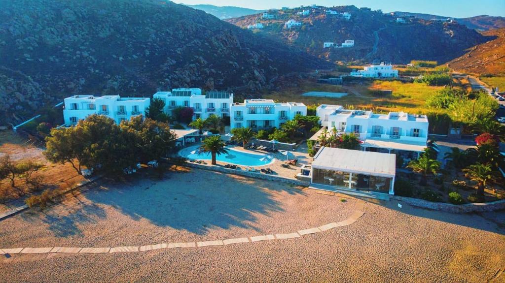 an aerial view of a small town with white buildings at Sunrise Hotel and Suites in Agrari