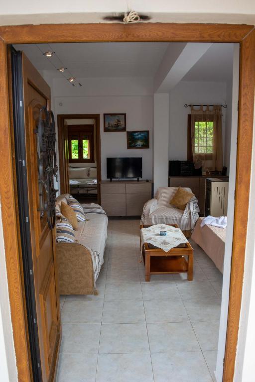 Postel nebo postele na pokoji v ubytování Efi's Guest House