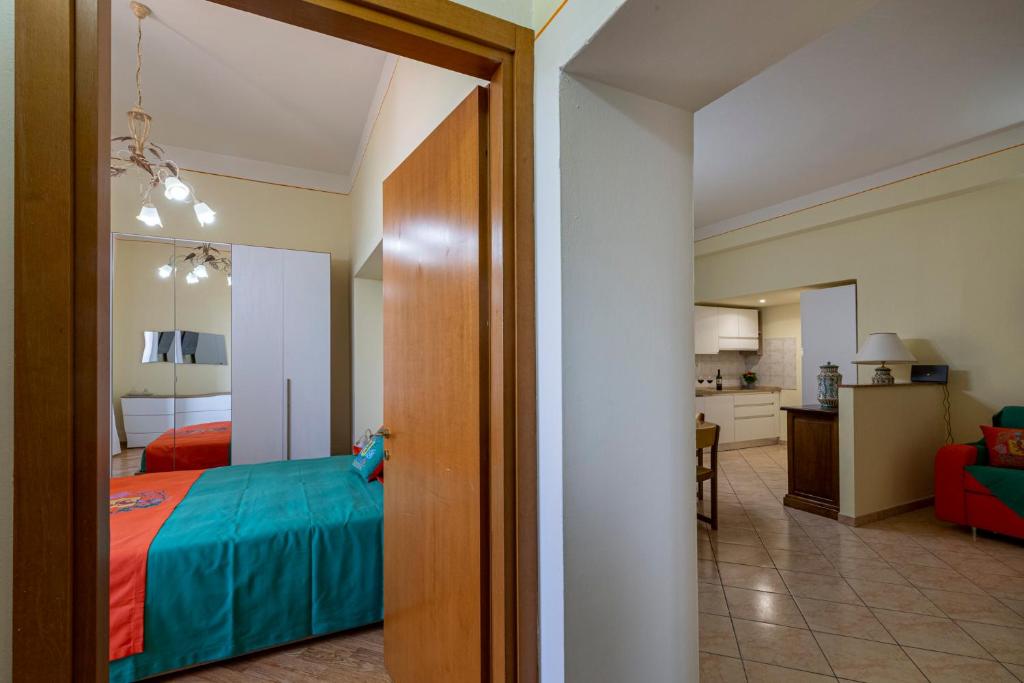 Postel nebo postele na pokoji v ubytování IBibiena - CASA CAMALDOLI