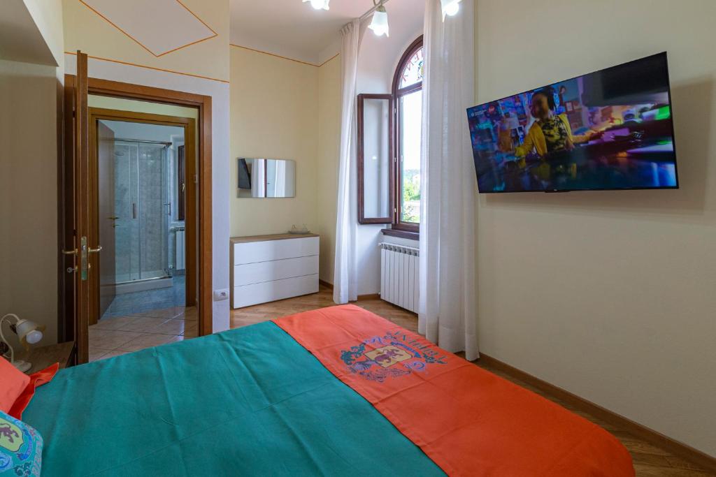 Postel nebo postele na pokoji v ubytování IBibiena - CASA CAMALDOLI