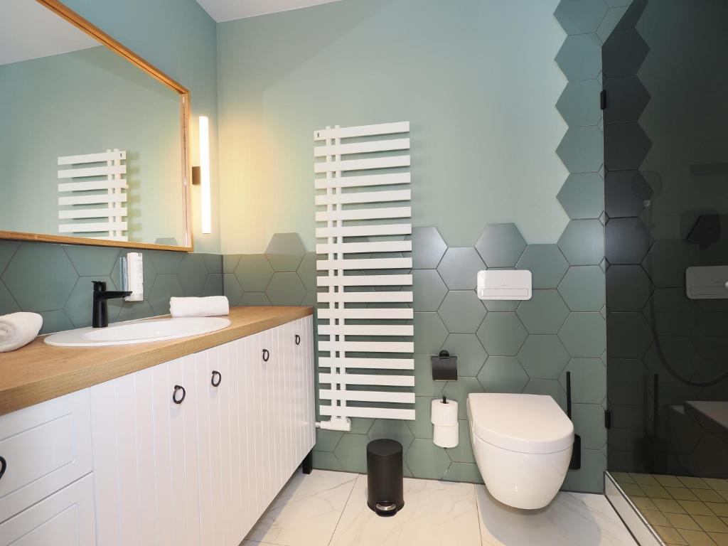 Koupelna v ubytování Seebrücke Heringsdorf - Appartement mit 2 Schlafzimmern und Terrasse S22