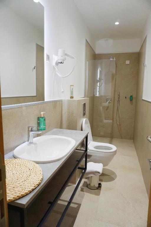 Koupelna v ubytování Hotel Credo