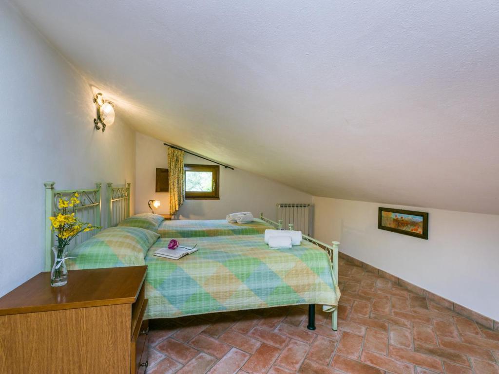 Postel nebo postele na pokoji v ubytování Apartment Montereggi-4 by Interhome