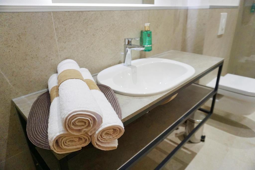 Koupelna v ubytování Hotel Credo