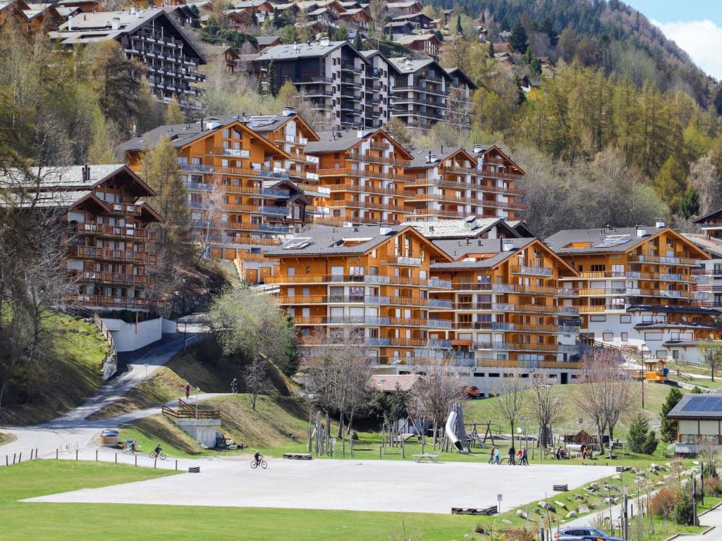 a large apartment building in a resort at Apartment Domaine des Reines D1A by Interhome in Nendaz