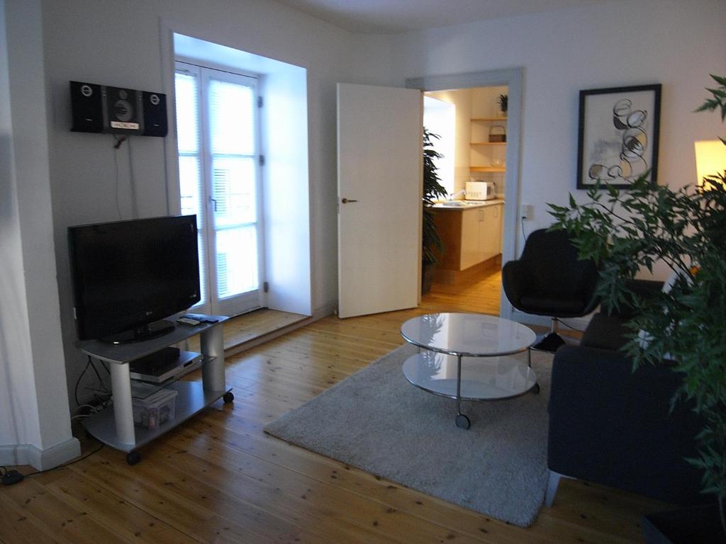 TV a/nebo společenská místnost v ubytování Vesterbro Apartments 70