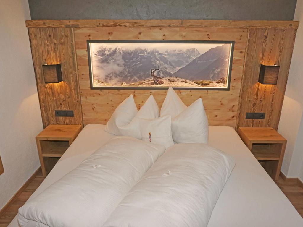 A bed or beds in a room at Apartment Ladis-11 by Interhome