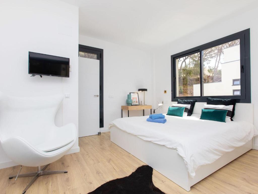 Televízia a/alebo spoločenská miestnosť v ubytovaní Holiday Home Alyssa by Interhome