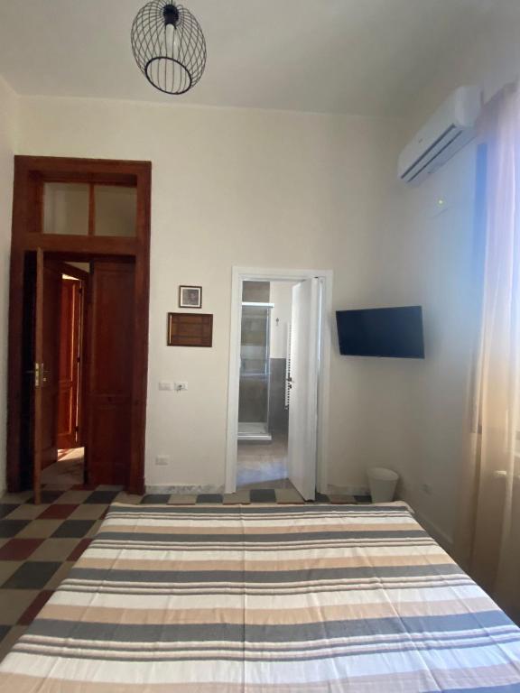 Postel nebo postele na pokoji v ubytování AmMARE
