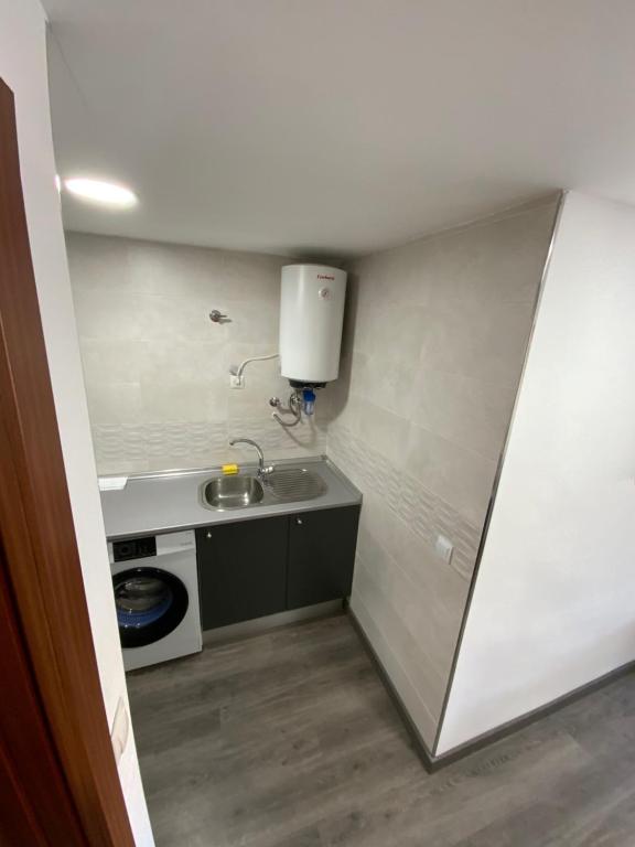 Kuchnia lub aneks kuchenny w obiekcie HEROE APARTAMENTO