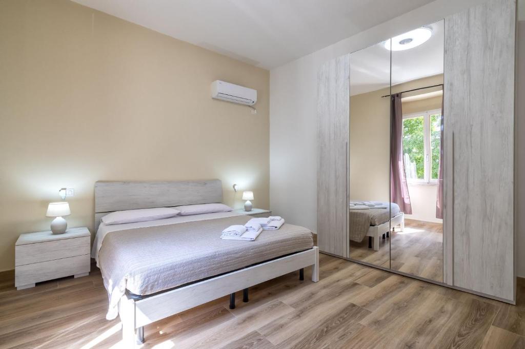 Posteľ alebo postele v izbe v ubytovaní Vico Rooms