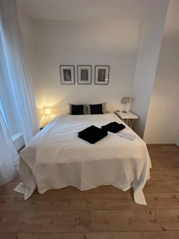 Postel nebo postele na pokoji v ubytování Prenzel-Suite-5