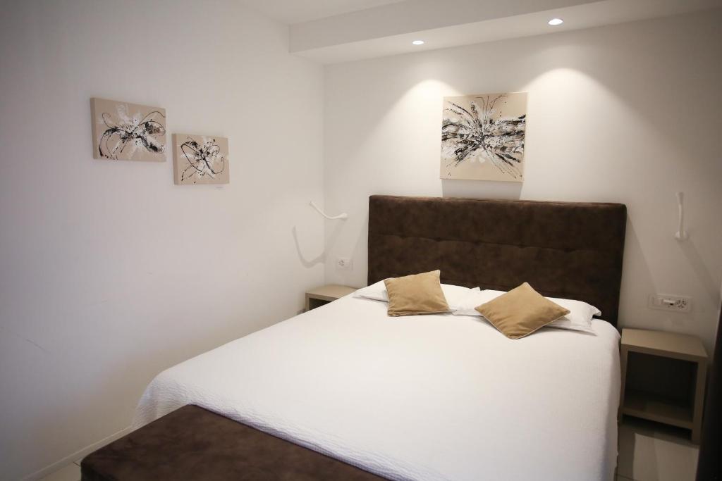 Postel nebo postele na pokoji v ubytování Hotel Bellavista Locarno