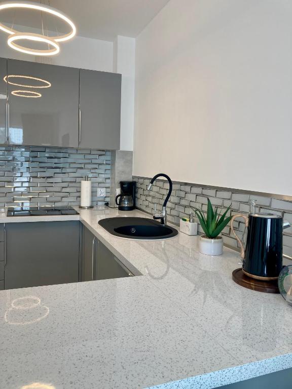 Kuchyňa alebo kuchynka v ubytovaní Apartament nr 18 - Apartamenty Wakacyjna 5