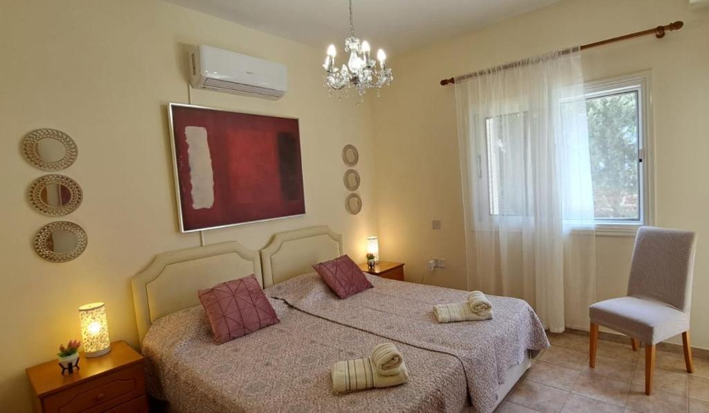 Postel nebo postele na pokoji v ubytování VILLA MARINA BY FIG TREE BAY