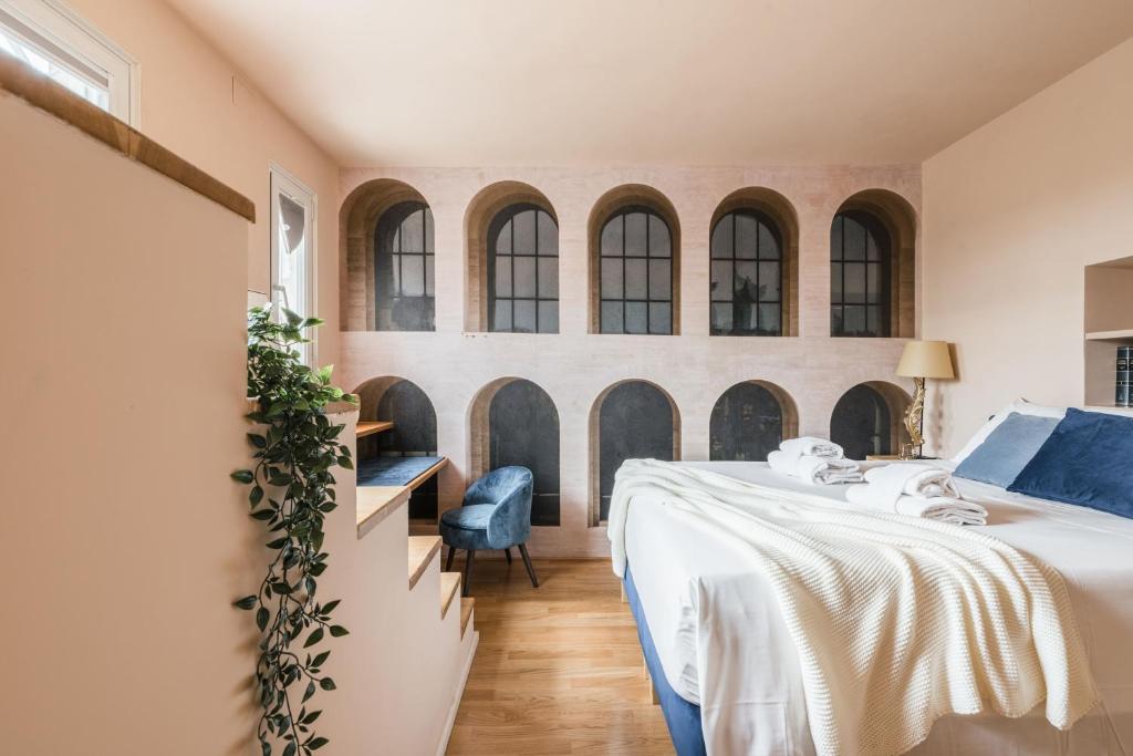 Posteľ alebo postele v izbe v ubytovaní The Best Rent - Spacious apartment with terraces with panoramic view of Rome