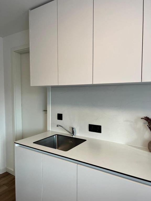 Kuchyň nebo kuchyňský kout v ubytování Hotel Harmshof Bispingen