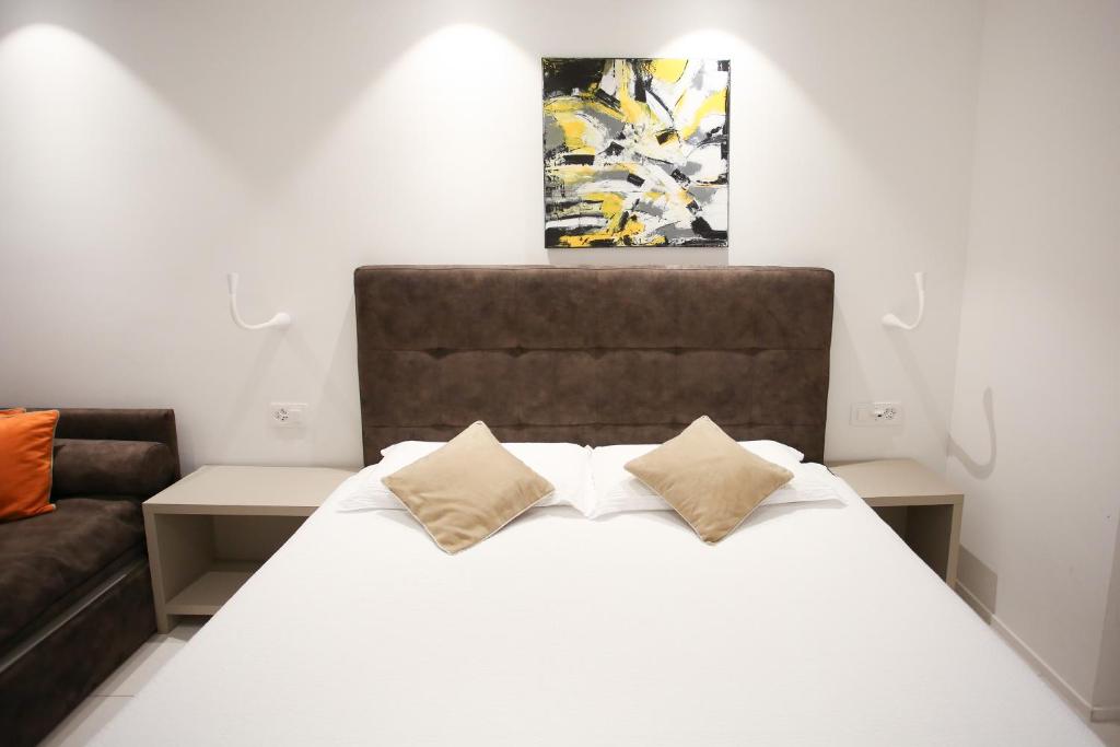Postel nebo postele na pokoji v ubytování Hotel Bellavista Locarno