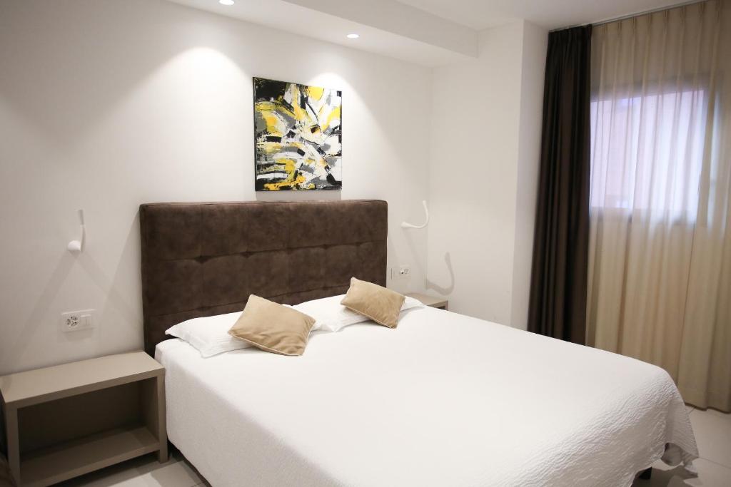 Postel nebo postele na pokoji v ubytování Hotel Bellavista Locarno