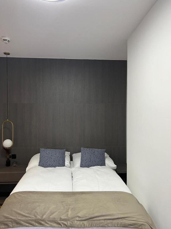 Postel nebo postele na pokoji v ubytování Hotel Harmshof Bispingen