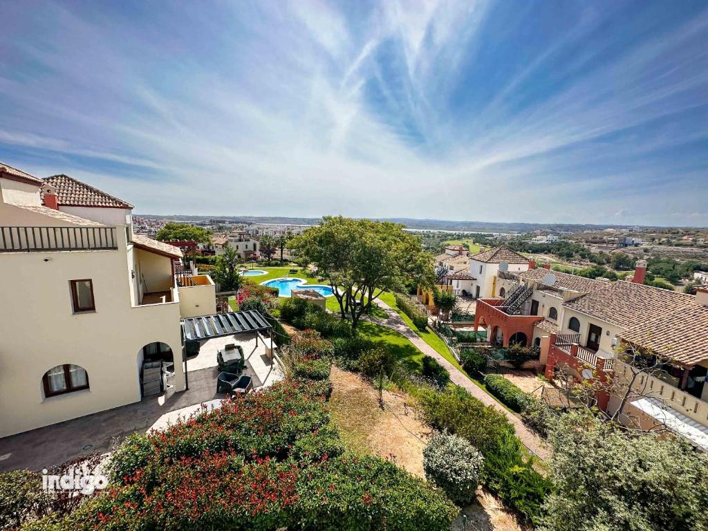 an aerial view of a house and a yard at Bright Refurbished 3 Bedroom Townhouse ALI001 in Ayamonte