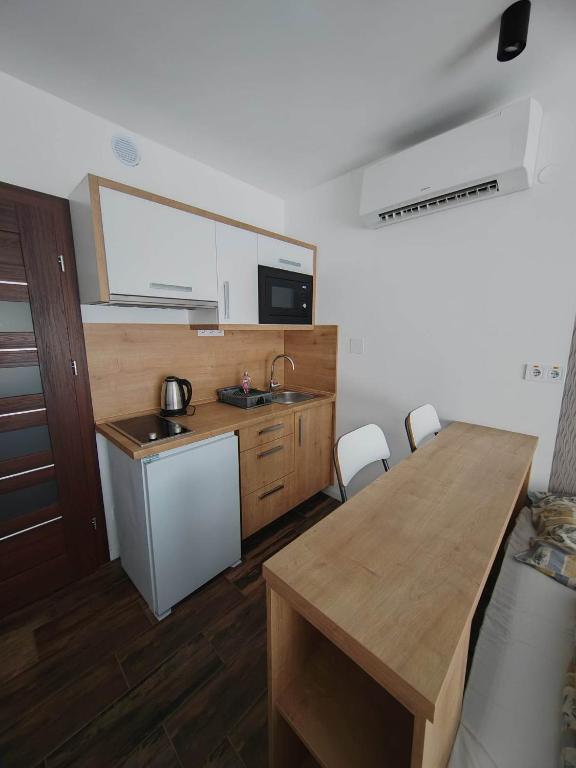 Kuchyňa alebo kuchynka v ubytovaní City panzió