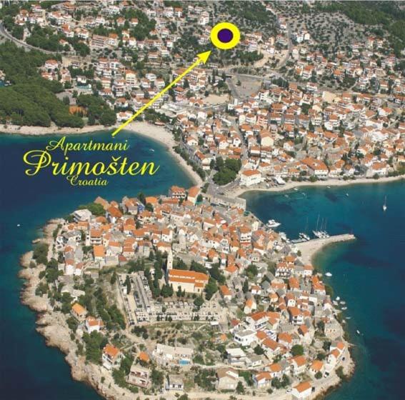 a map of an island with a yellow circle on it at Apartments Primosten in Primošten