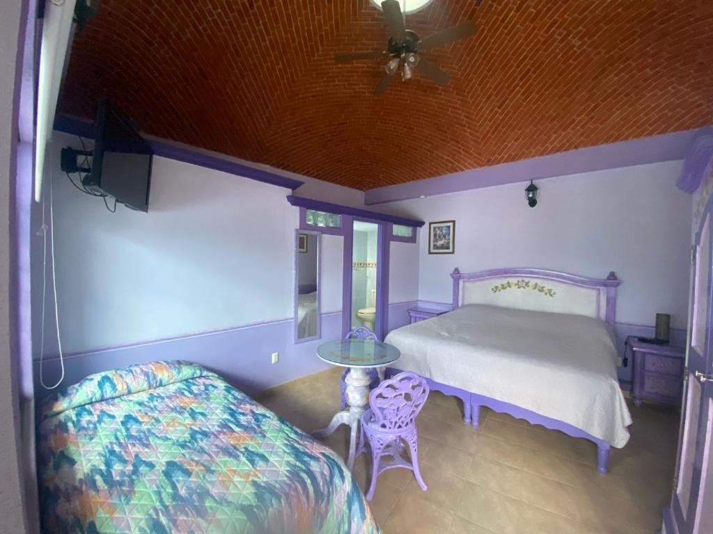 Postel nebo postele na pokoji v ubytování Casa Morada