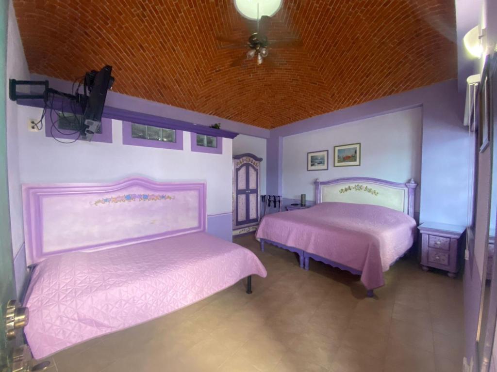 Postel nebo postele na pokoji v ubytování Casa Morada