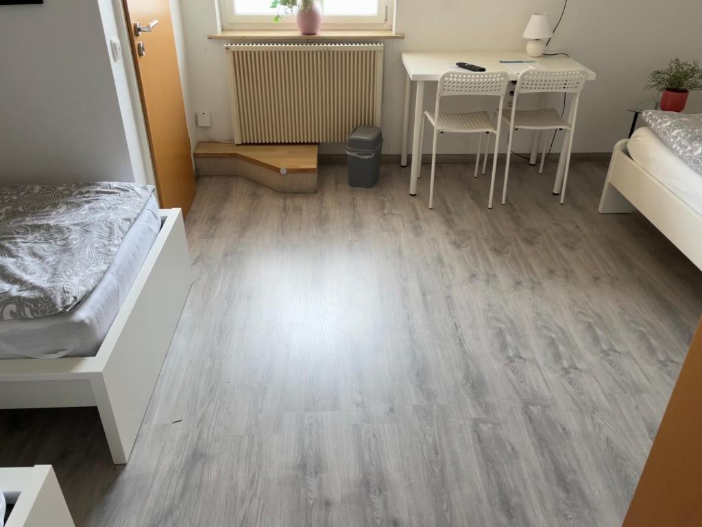 Postel nebo postele na pokoji v ubytování Pension Platzhirsch