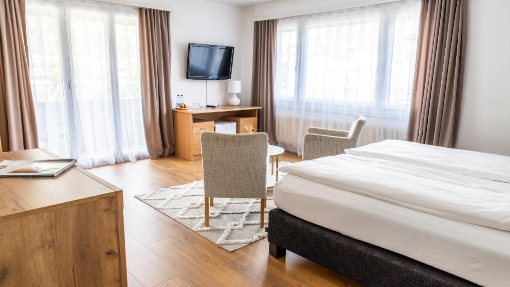 TV a/nebo společenská místnost v ubytování Hotel Europe Brig