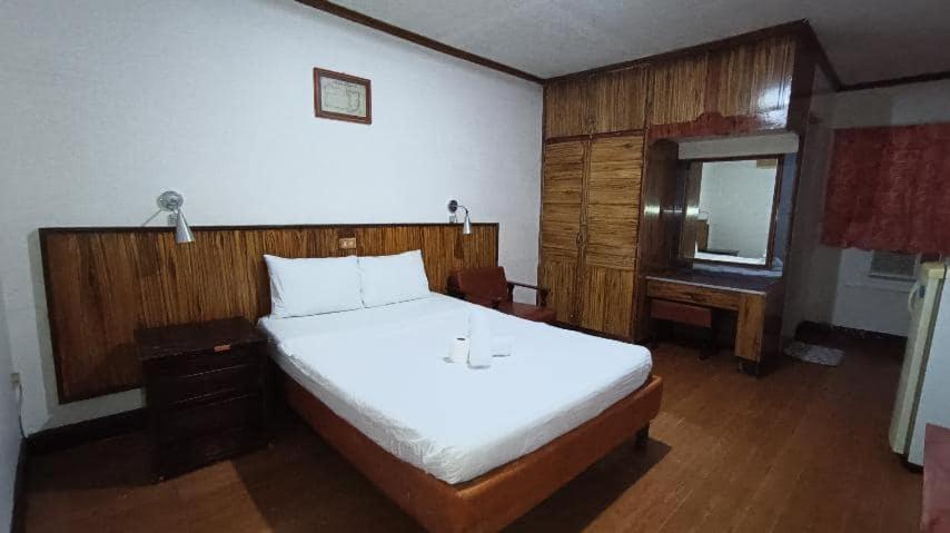 Postel nebo postele na pokoji v ubytování 2 Hotel Saleh