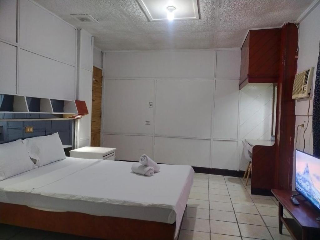 Postel nebo postele na pokoji v ubytování 2 Hotel Saleh